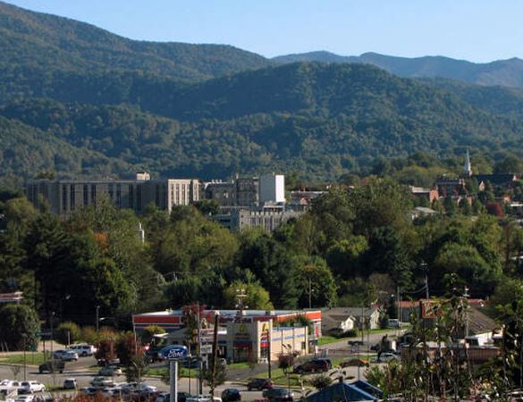 Small town in front of mountains